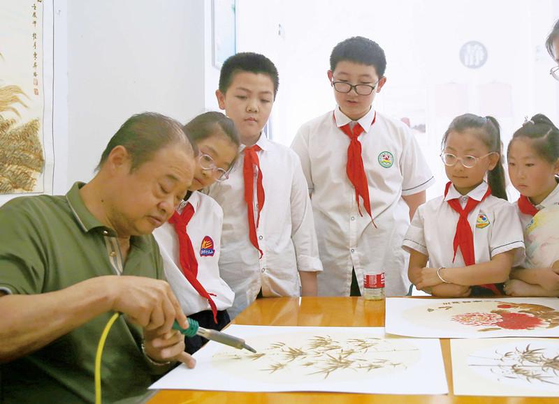 【信“遗”风】以火为墨绘大别山魂