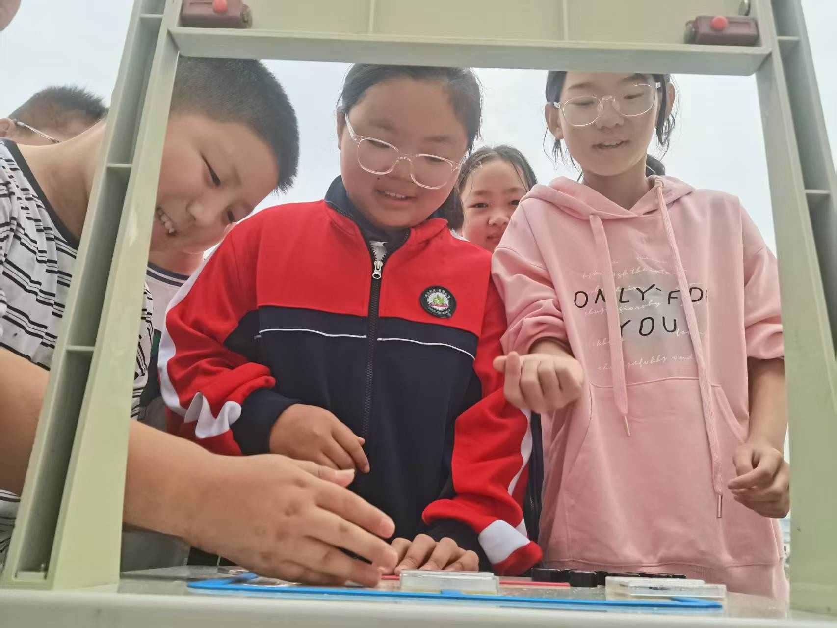 科普筑梦 智启未来 市科技馆全国科普月系列活动走进羊山新区二十里河春蕾小学